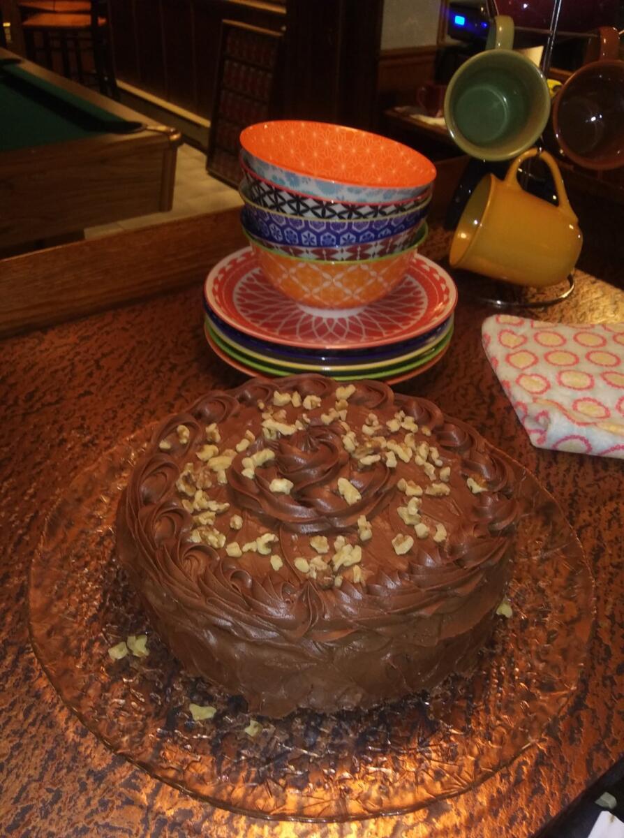 Chocolate birthday cake with walnuts